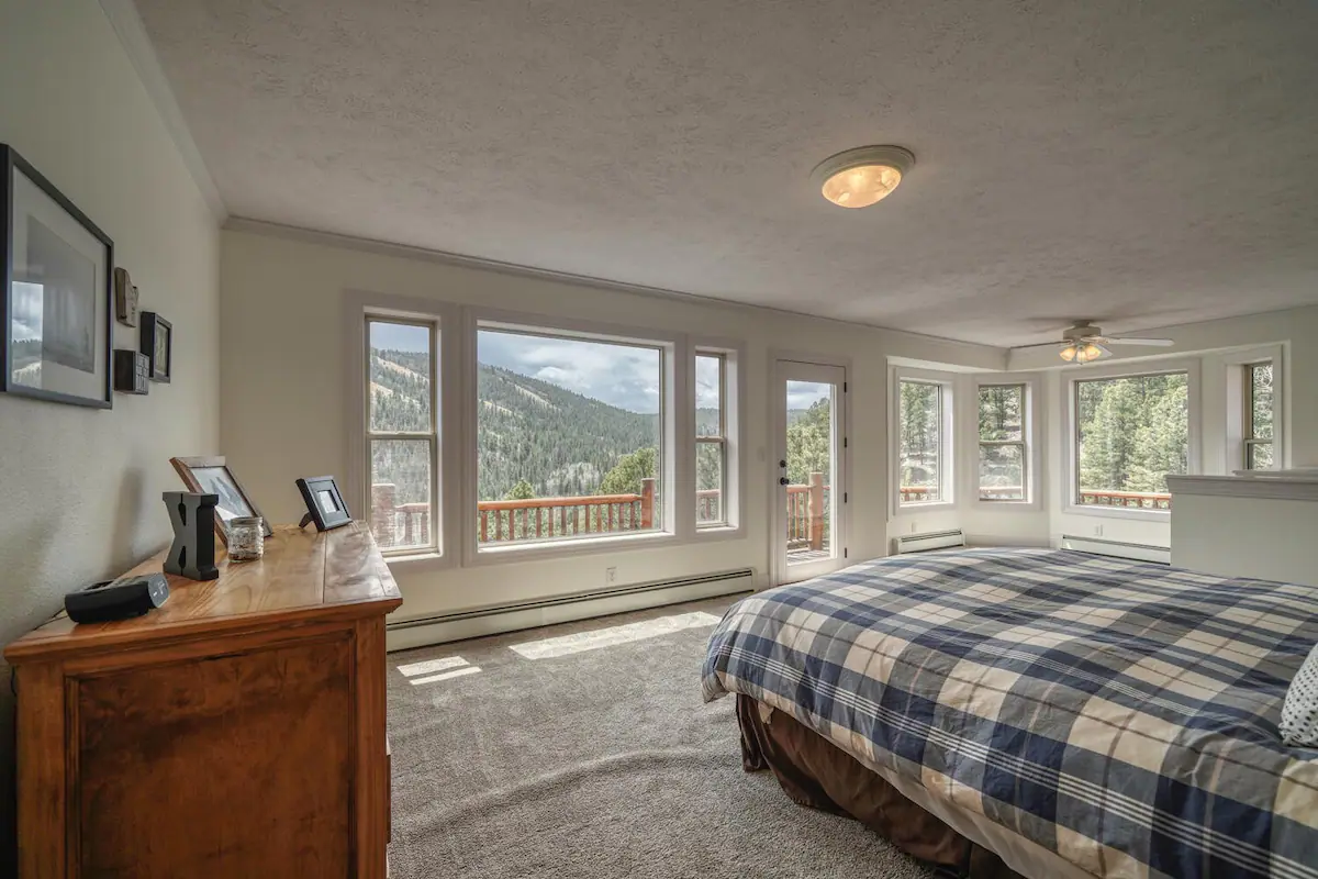 Vacation Rental in Salida Colorado with Mountain Views - Large bedroom with expansive windows mountain views