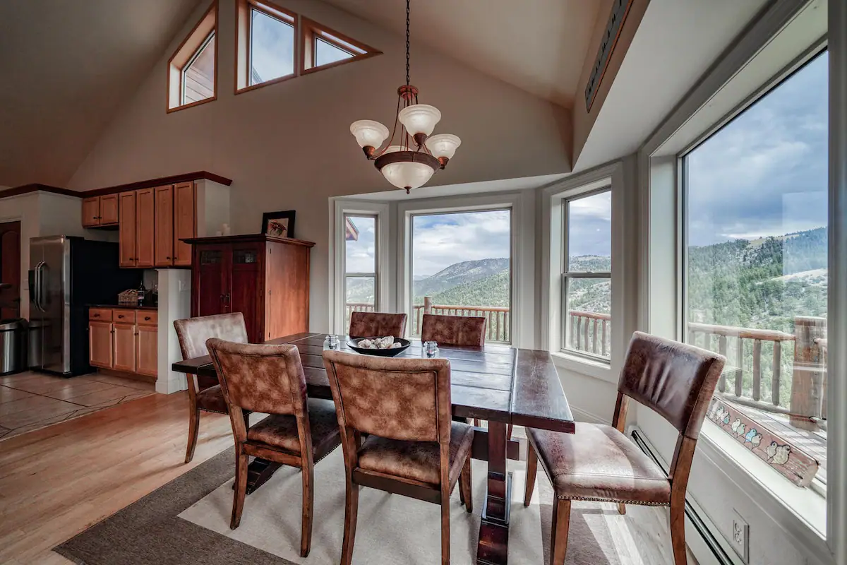 Vacation Rental in Salida Colorado with Mountain Views - Dining room with expansive windows mountain views